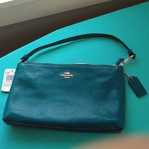 Coach clutch/wristlet